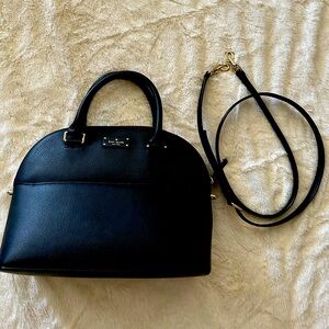 Kate spade black satchel. Shoulder strap included. Open inside.